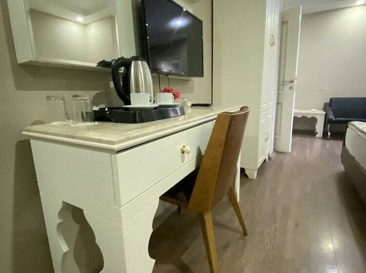Economy Triple Room, Kent Ani
