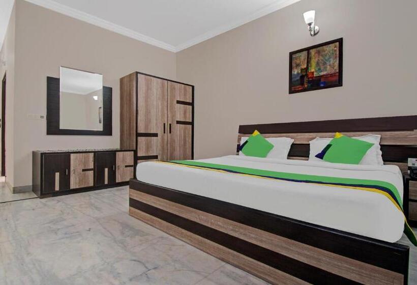 Habitació Deluxe, Treebo Maharaja Residency