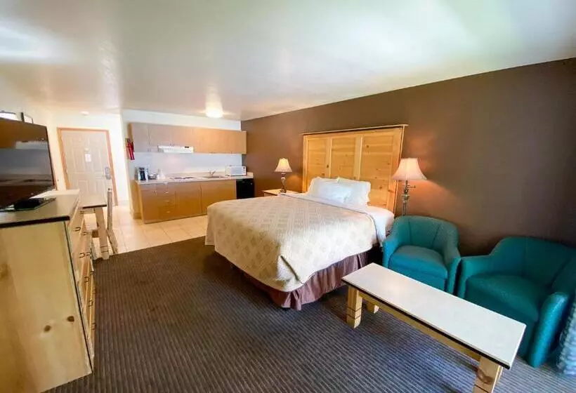 キングサイズベッドのスタンダードルーム, Sisters Inn & Suites