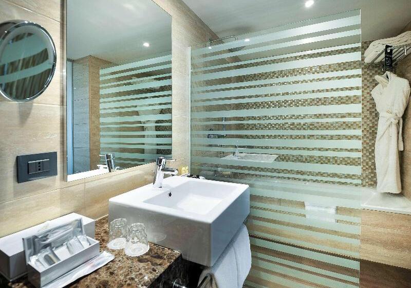 Deluxe Suite King Bed, Pullman Kinshasa Grand