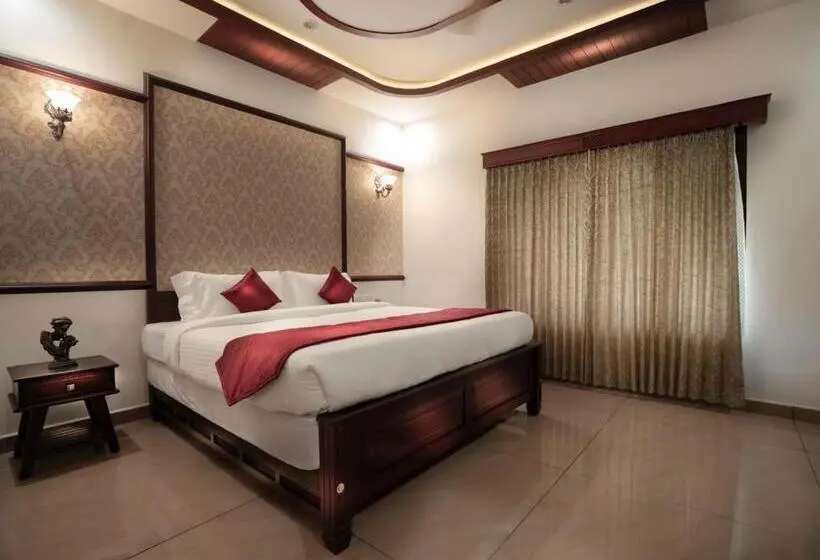 キングサイズベッドのデラックスルーム, Wayanad Mace Mansion