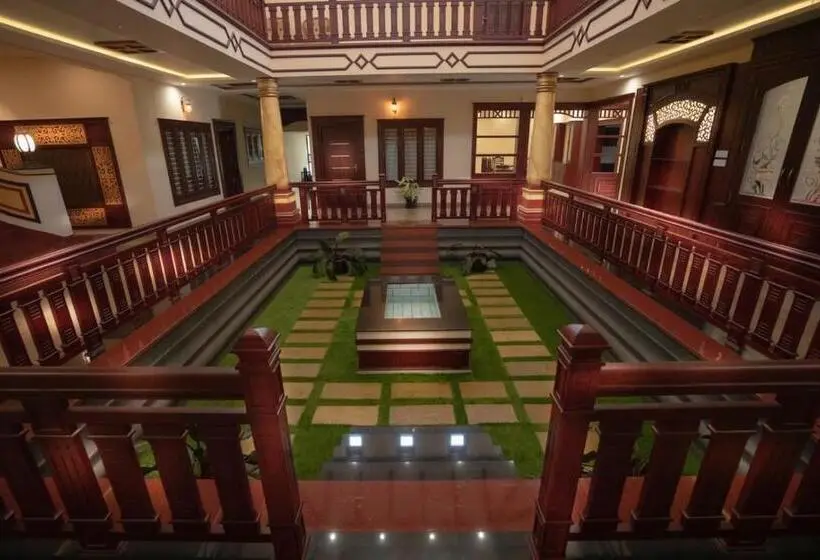 キングサイズベッドのデラックスルーム, Wayanad Mace Mansion