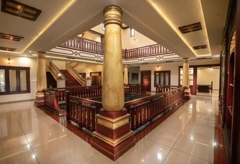 キングサイズベッドのデラックスルーム, Wayanad Mace Mansion