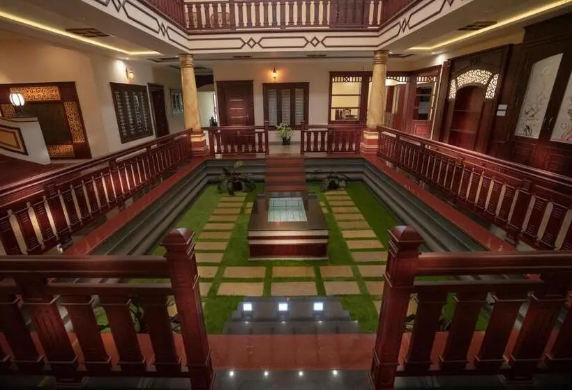 キングサイズベッドのデラックスルーム, Wayanad Mace Mansion