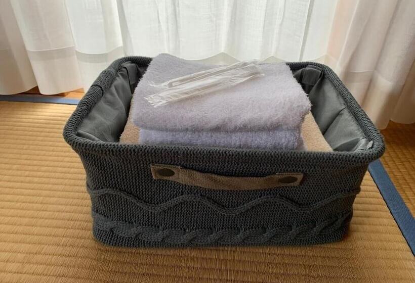 اتاق خانوادگی, Guest House En