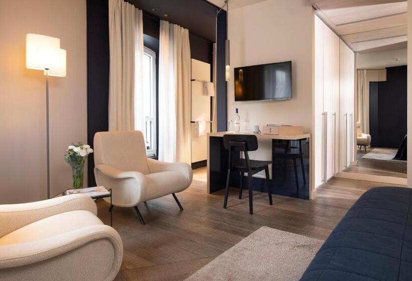 デラックスルーム, De Nell