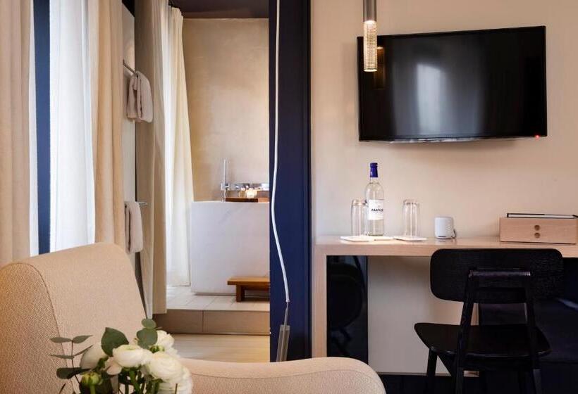 デラックスルーム, De Nell