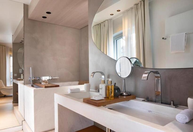 プレステージルーム, De Nell