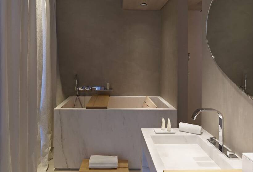 デラックスルーム, De Nell