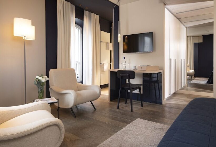 デラックスルーム, De Nell