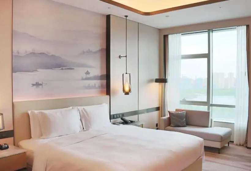キングサイズベッドのデラックスルーム, Pullman Suzhou Taicang