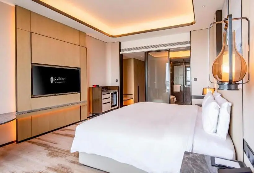キングサイズベッドのデラックスルーム, Pullman Suzhou Taicang