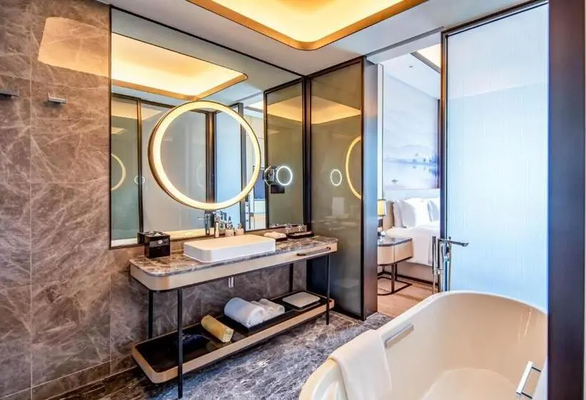 キングサイズベッドのデラックスルーム, Pullman Suzhou Taicang