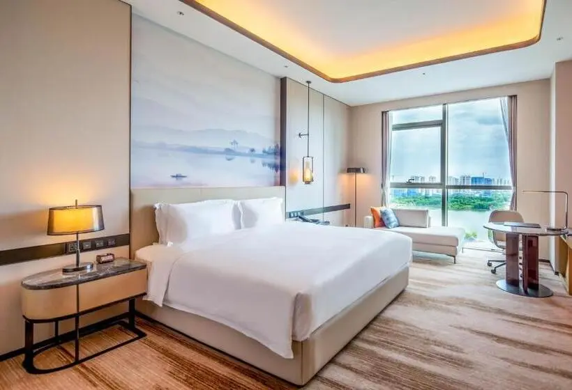 キングサイズベッドのデラックスルーム, Pullman Suzhou Taicang