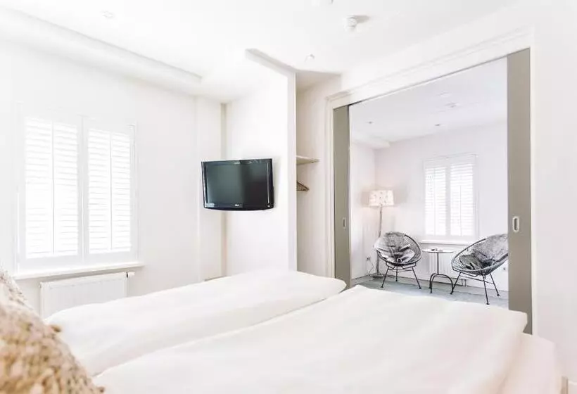 Royal-sviitti, Logement Overzee