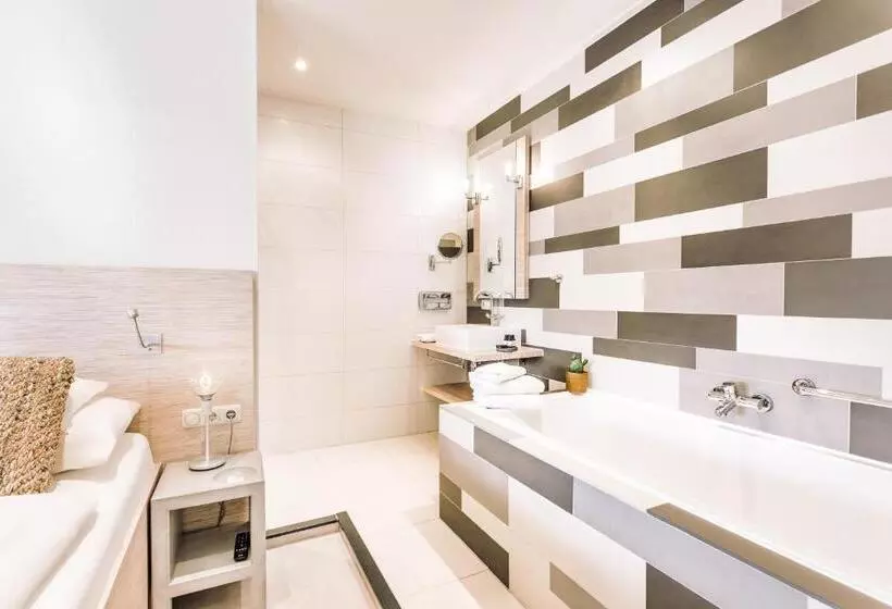 Deluxe-sviitti, Logement Overzee