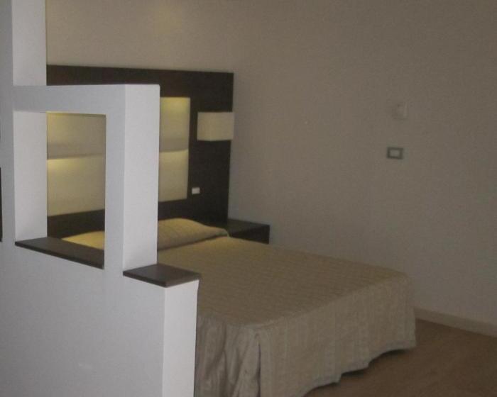 Deluxe Kolmen Hengen Huone, Eros