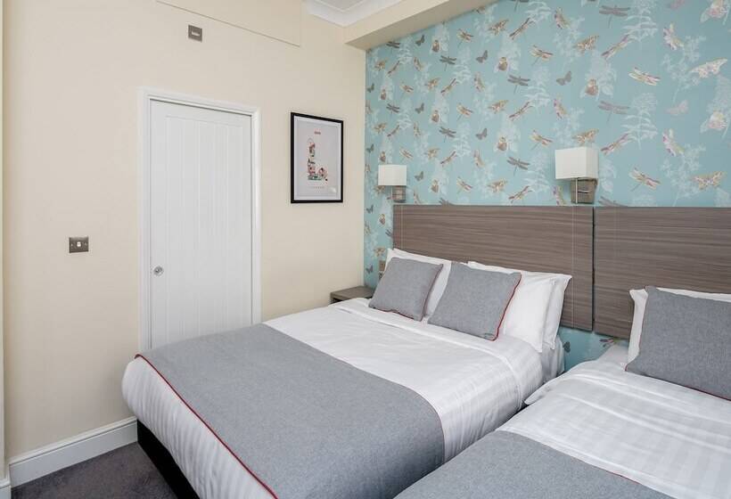 Habitació Triple Deluxe, Bed&Breakfast Bakers