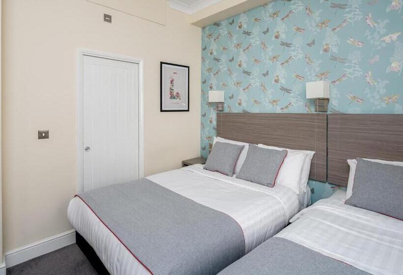 Habitació Triple Deluxe, Bed&Breakfast Bakers