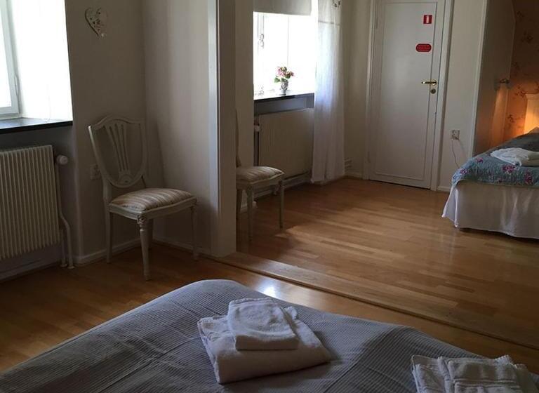 חדר משפחתי, Herrgårds Hotell Gyllene Hästen