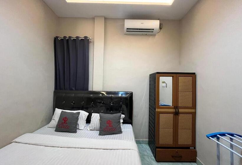 디럭스 룸, Steze Guesthouse Syariah Mendalo