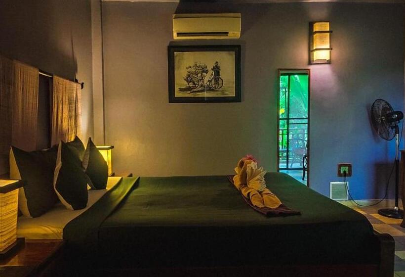 بنجلو قياسى, Au Cabaret Vert