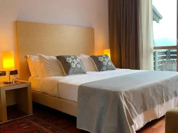 コネクティングルーム(家族用)。, Savoia Mountain – Il Resort Nel Bosco