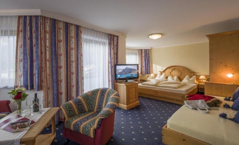 חדר דלוקס לשלושה, Andrea