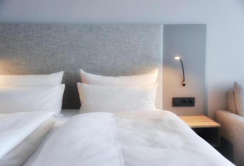 舒适型房间, Am Berghang