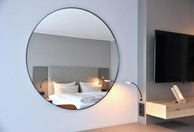 舒适型房间, Am Berghang