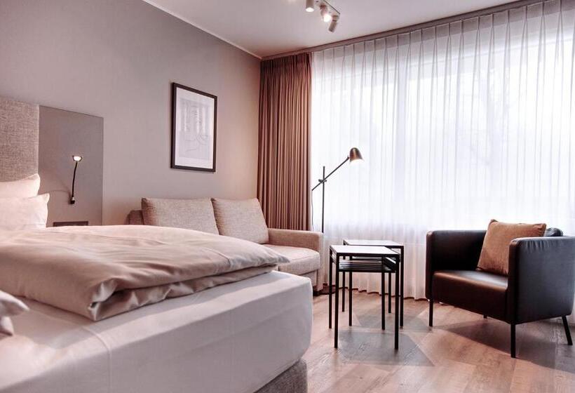 舒适型房间, Am Berghang