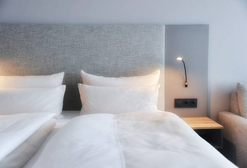 舒适型房间, Am Berghang