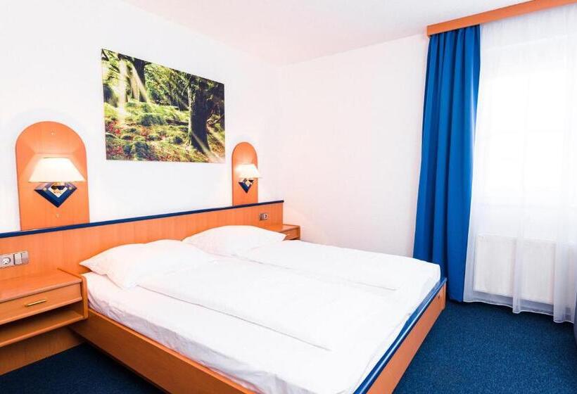 Quarto Estandar, Am Park