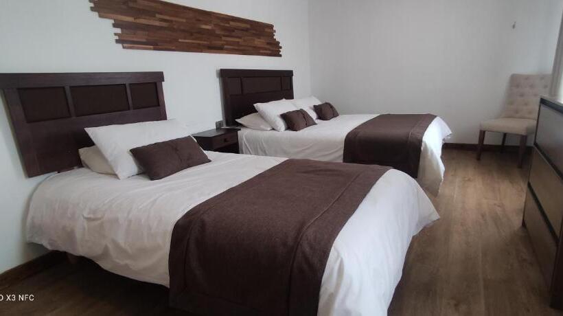 חדר דלוקס לשלושה, Y Cabañas Pulegan