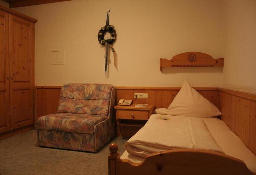 이코노미 싱글 룸, Am Kamin