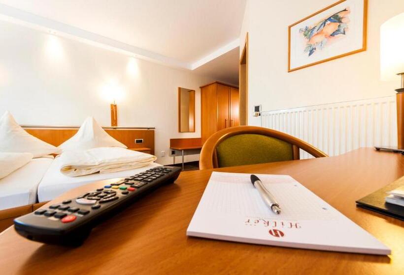 Номер Стандарт, Hilker