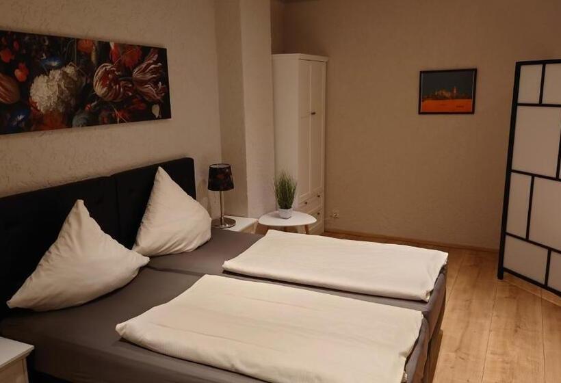 스위트, Pension Am Schloss