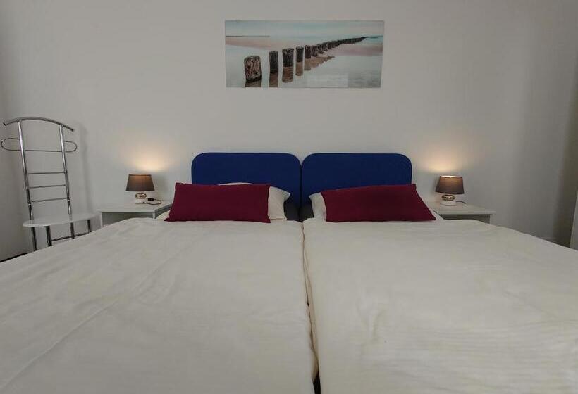 스위트, Pension Am Schloss