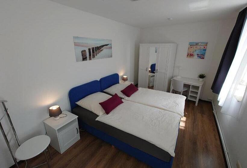 스위트, Pension Am Schloss