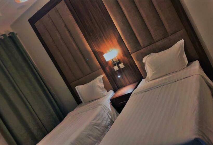 キングサイズベッドのスイートルーム, الشاطئ الأبيض للشقق المخدومة