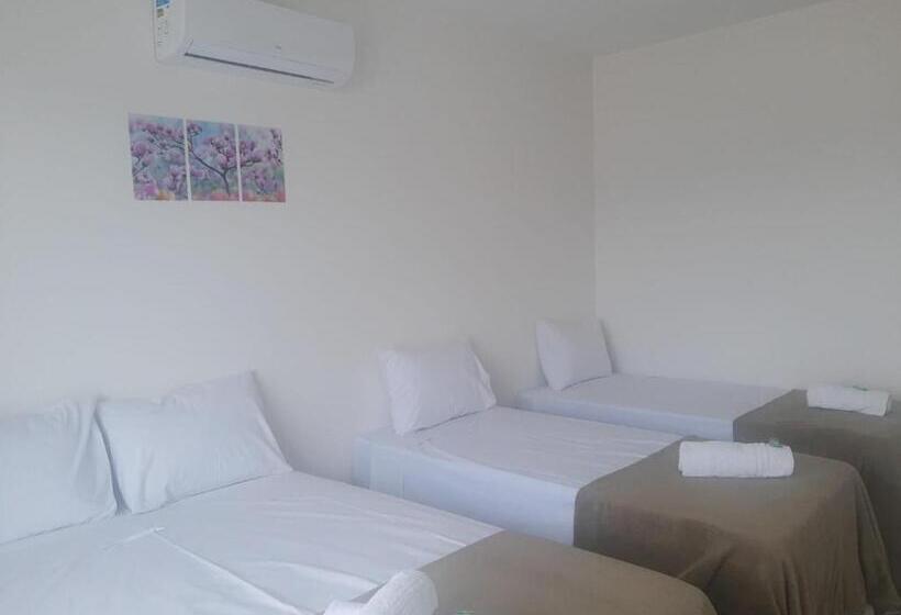 غرفة قياسية رباعية مزودة بشُرفة, Pousada Vale Do Sol Capitólio