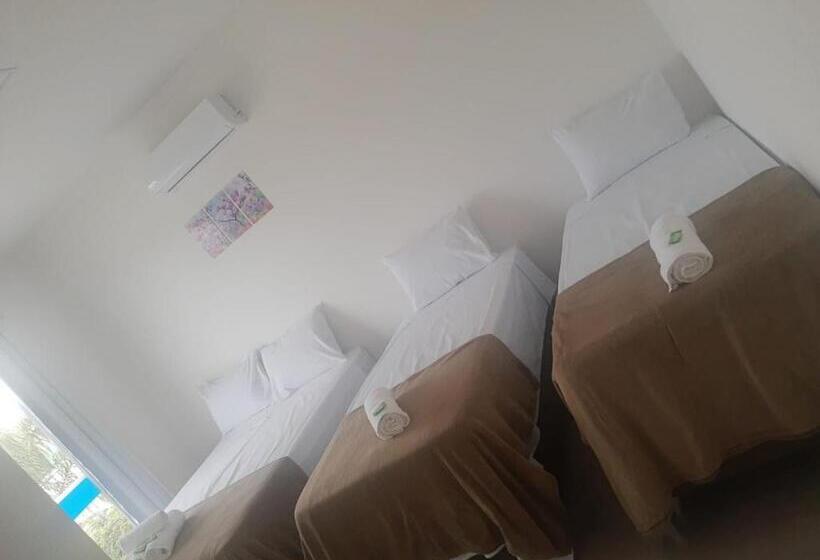 غرفة قياسية رباعية مزودة بشُرفة, Pousada Vale Do Sol Capitólio