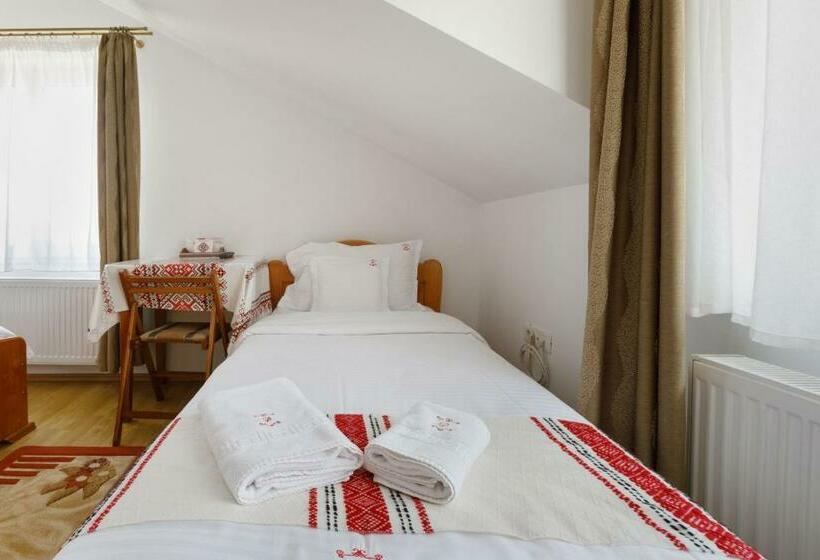 标准三人间, Casa Dacică