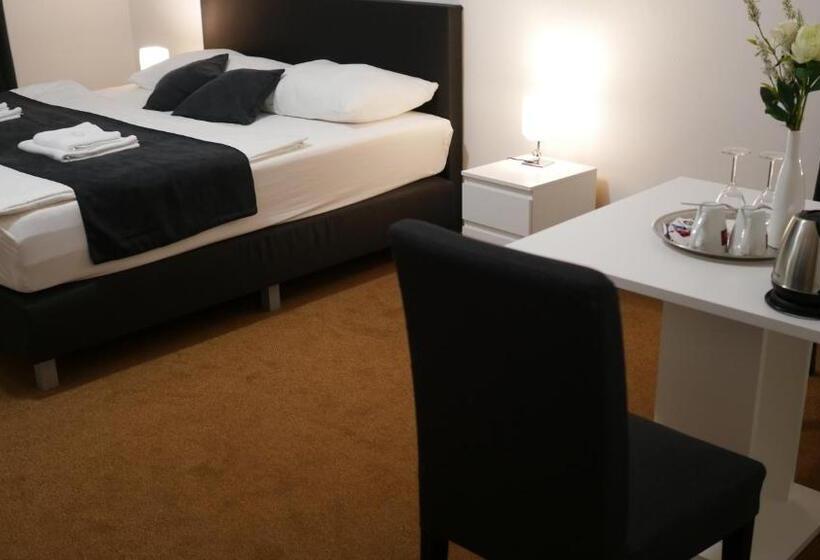 Pokój Deluxe, Bílý Koníček