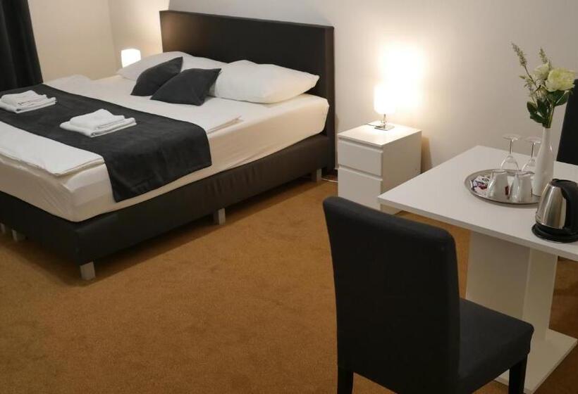 Pokój Deluxe, Bílý Koníček