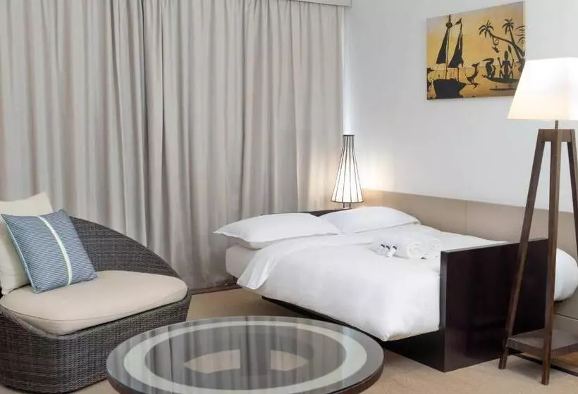 اتاق استاندارد با بالکن و چشمانداز باغ, Sheraton New Caledonia Deva Spa & Golf Resort
