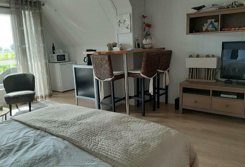 חדר דלוקס, In De Wolken