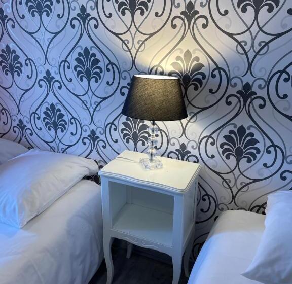 חדר סטנדרט לארבעה, Au Chapon Fin