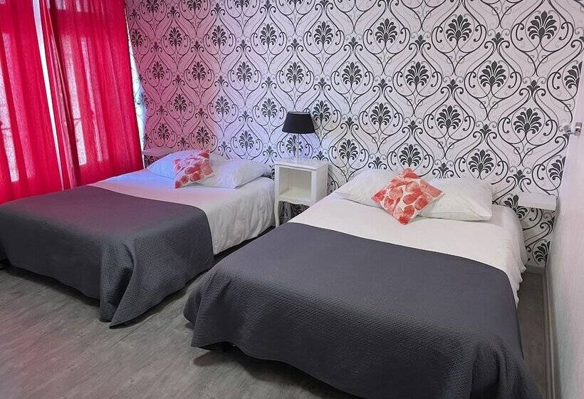 חדר סטנדרט לארבעה, Au Chapon Fin