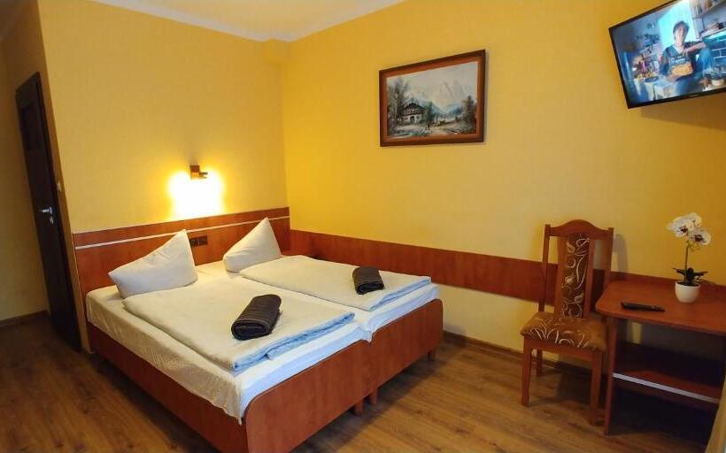Quarto Quadruple Standart com Varanda, Riwiera Dźwirzyno